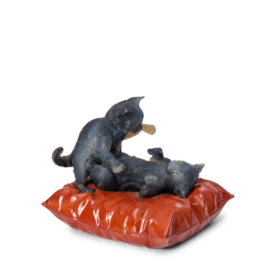 A Hardstone and Red Jasper Model of Two Cats Playing: A Hardstone and Red Jasper Model of Two Cats Playing 20th century with inset eyes on red jasper cushion height 4 1/2 in. (11.43 cm.); length 4 7/8 in. (12.38 cm.); width 4 1/8 in. (10.47 cm.) Footnote
