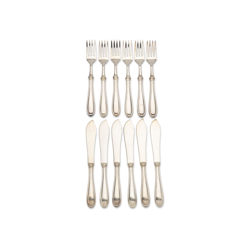 A set of sterling silver fish knives and fish forks (12): A set of sterling silver fish knives and fish forks each of 6 pieces, indistinct maker's marks, possibly Italian, marked NM40, purity .800, weight total 603 grams (12). For further information on