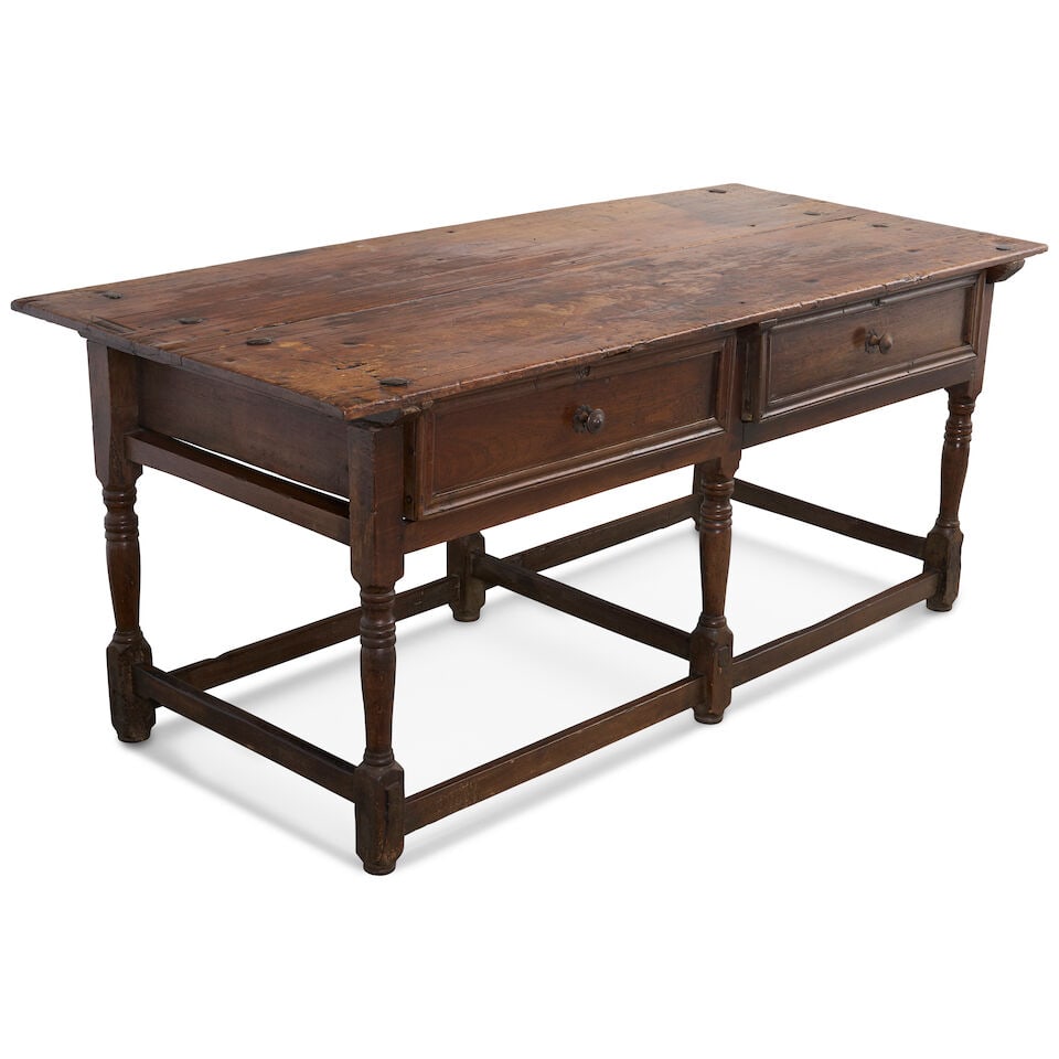 A Continental Provincial work table, late 17th / early 18th century,: A Continental Provincial work table, late 17th / early 18th century, with two plank top, secured by four large handmade fixings on each end, above two frieze drawers, on turned legs, with boxed