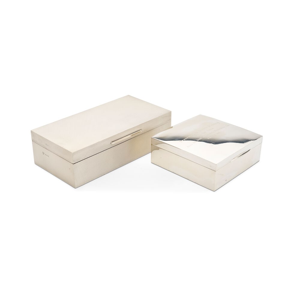 Two silver boxes: Two silver boxes including a cigarette box marked Wai Kee Hong Kong Sterling 88, engraved 'Presented to Sverre Rodskog with best wishes from the Staff of Rodskog Shipbrokers Ltd. January 1986', and