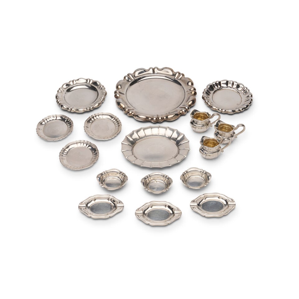 A set of German 800 standard silver table accessories, Marks of Gebrüder Kühn, Schwabi...: A set of German 800 standard silver table accessories, Marks of Gebrüder Kühn, Schwabisch Gmünd to some pieces, early 20th century, comprising three miniature sauce jugs, three small