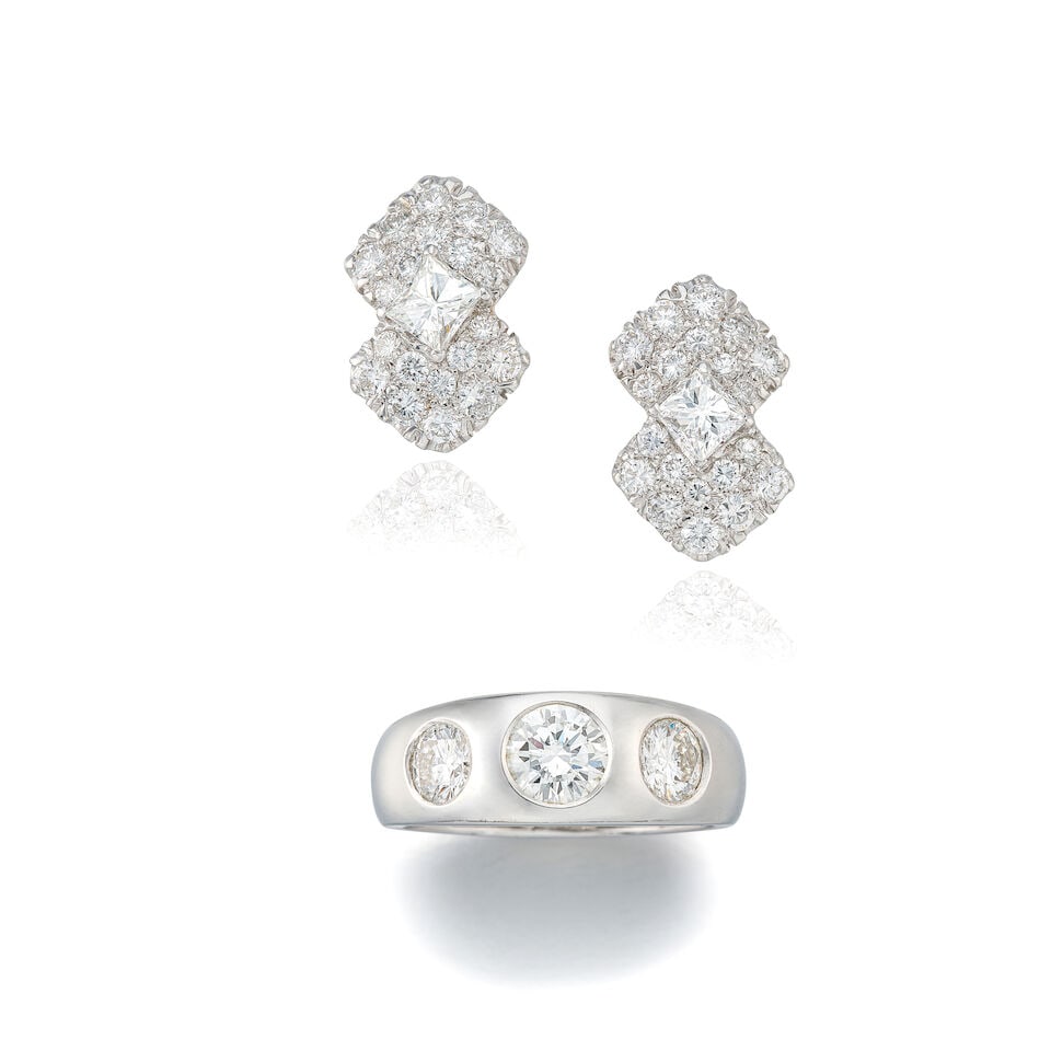 DIAMOND RING AND EARRINGS (2): DIAMOND RING AND EARRINGS 鑽石戒指及耳環 Metal: 18 karat white gold Ring size: 7 Earring dimensions: 1.8 x 1.2cm Gross weight: ring 7.3g; earrings