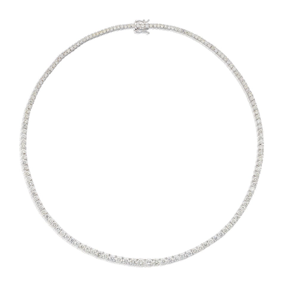 DIAMOND RIVIÈRE NECKLACE: DIAMOND RIVIÈRE NECKLACE 鑽石項鍊 Diamonds: 152pcs, stamped 11.72cts Metal: 18 karat white gold Length: 40.5cm Gross weight: 21.0g Footnotes: CONDITION REPORT In