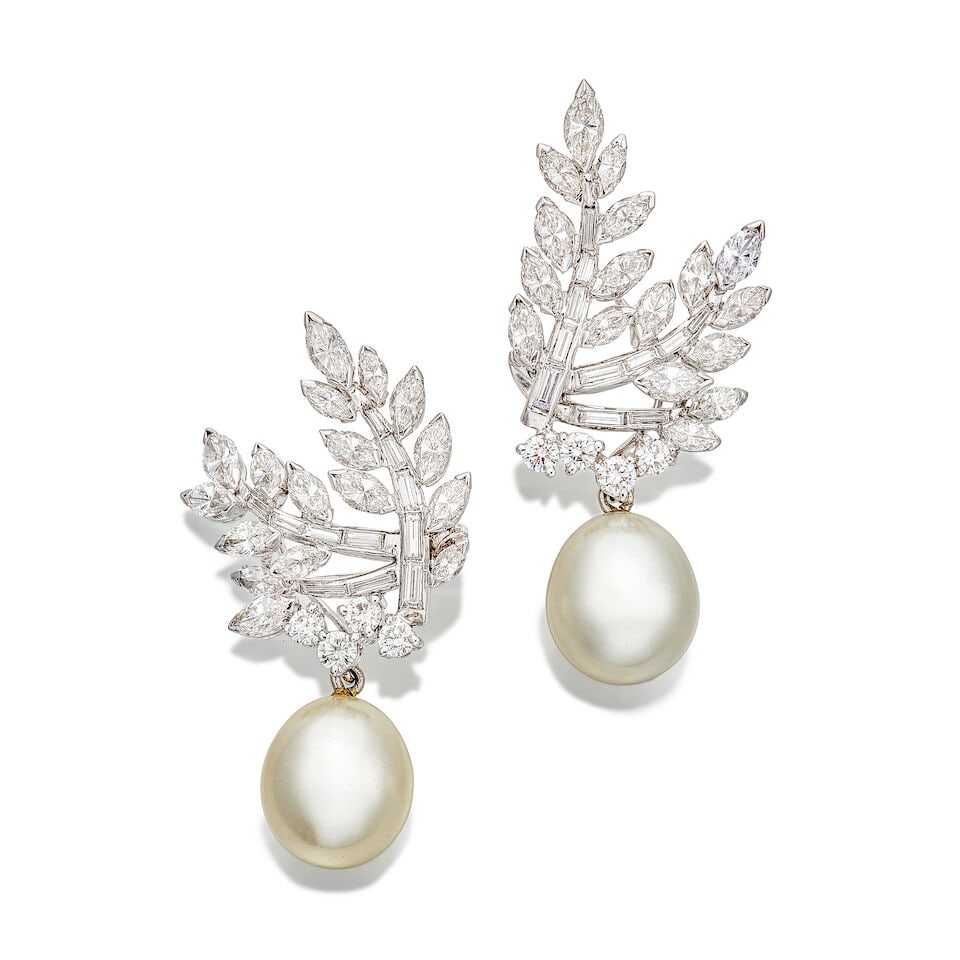 PAIR OF CULTURED PEARL AND DIAMOND PENDENT EARRINGS: PAIR OF CULTURED PEARL AND DIAMOND PENDENT EARRINGS 養殖珍珠配鑽石吊墜耳環 Cultured pearls: approx. 11.00 x 11.05 x 12.45mm and 11.05 