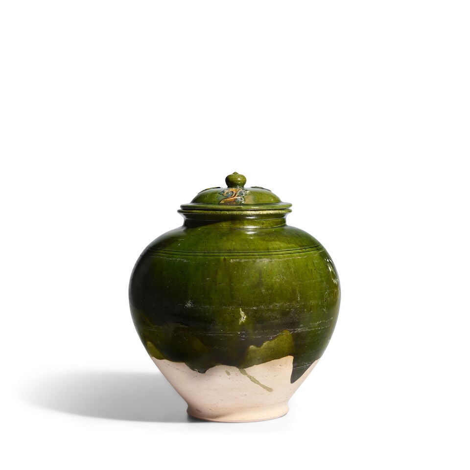 A LARGE GREEN AND SANCAI-GLAZED POTTERY JAR AND COVER Tang Dynasty (1 of 3)
