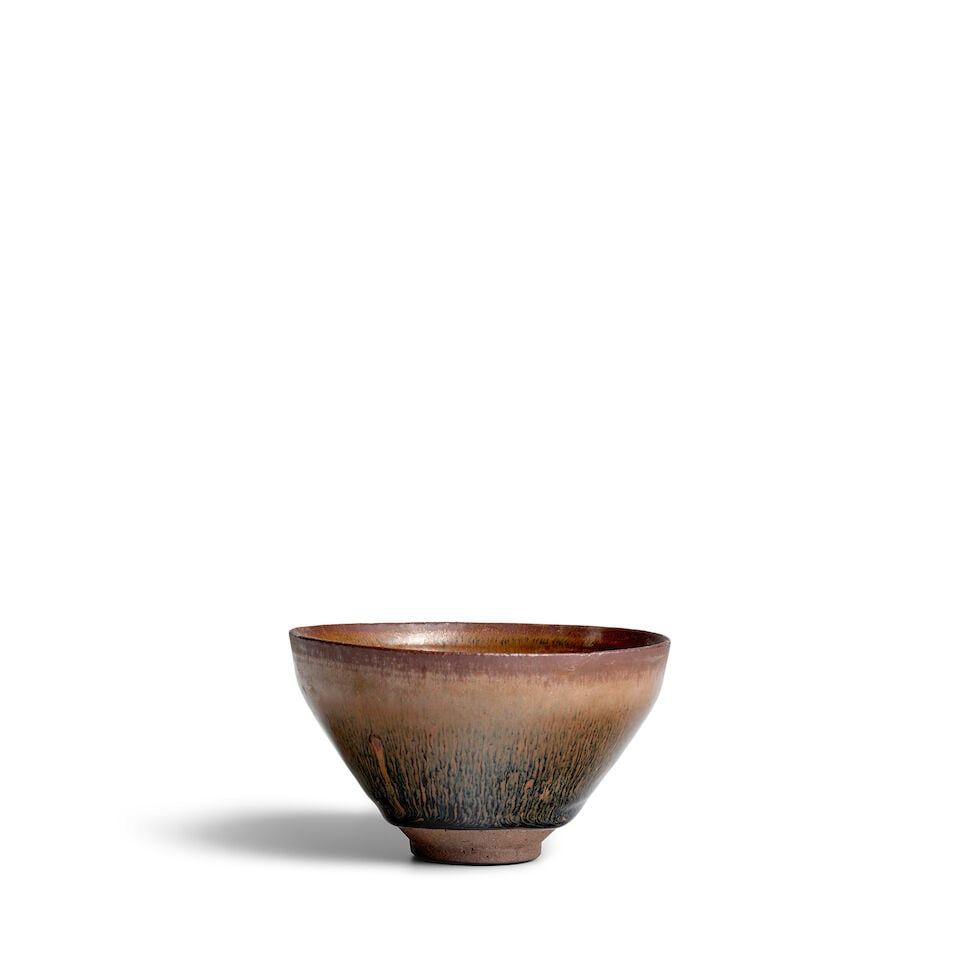 A JIAN 'HARE'S FUR' TEA BOWL Southern Song Dynasty (blue box): A JIAN 'HARE'S FUR' TEA BOWL Southern Song Dynasty 4 7/8in (12.4cm) diam (blue box). Footnotes: 南宋 建窯兔毫紋盞 Provenance: Penglai Shanfang Collectio
