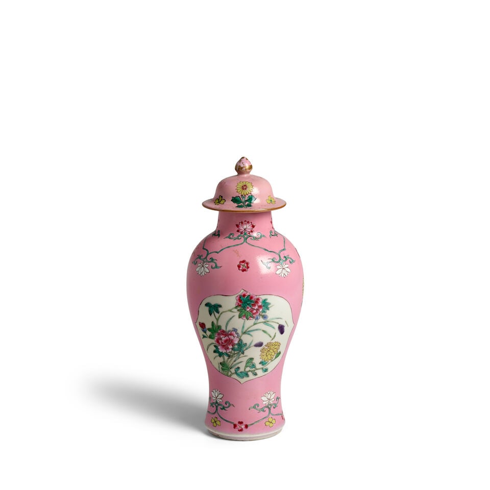 A PINK-GROUND FAMILLE-ROSE SLENDER BALUSTER VASE AND COVER Circa 1730 - 2