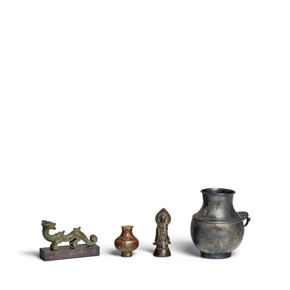 A GROUP OF FOUR METALWORKS Dragon handle: Eastern Zhou Dynasty; Miniature inlaid jar: Han Dynas...: A GROUP OF FOUR METALWORKS Dragon handle: Eastern Zhou Dynasty; Miniature inlaid jar: Han Dynasty; Standing bodhisattva: Sui style, 20th century; Handled jar: Tang style, 20th century The largest 3 5/