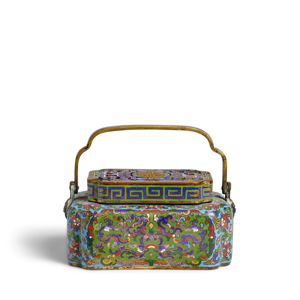 A CLOISONNÉ ENAMEL 'LOTUS' HANDWARMER 18th century: A CLOISONNÉ ENAMEL 'LOTUS' HANDWARMER 18th century 6 7/8in (17.5cm) across Footnotes: 十八世紀