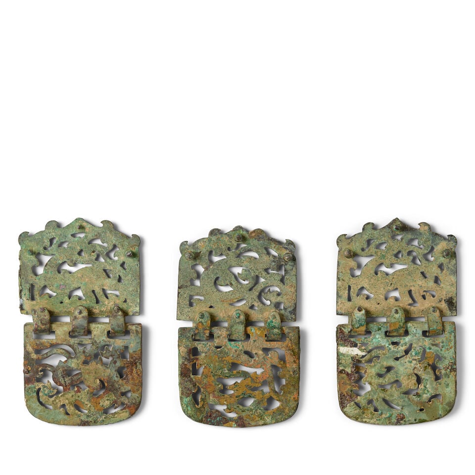 A GROUP OF THREE GILT-BRONZE 'DRAGON' HINGED ORNAMENTS Six Dynasties (3) - 2