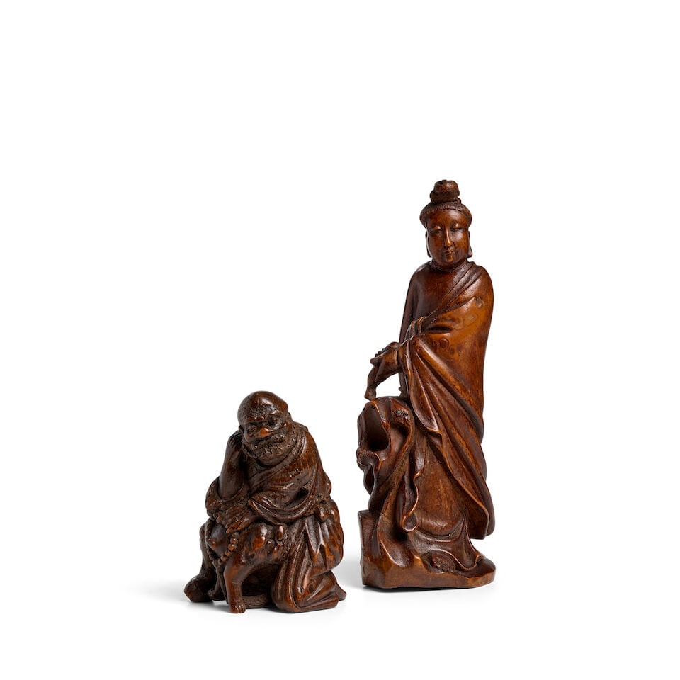 TWO BAMBOO ROOT CARVINGS OF BUDDHIST DEITIES, GUANYIN AND LUOHAN Qing Dynasty (2): TWO BAMBOO ROOT CARVINGS OF BUDDHIST DEITIES, GUANYIN AND LUOHAN Qing Dynasty 7 7/8in (20cm); 4in (10.2cm) high (2). Footnotes: 清 竹根雕佛教神祇兩