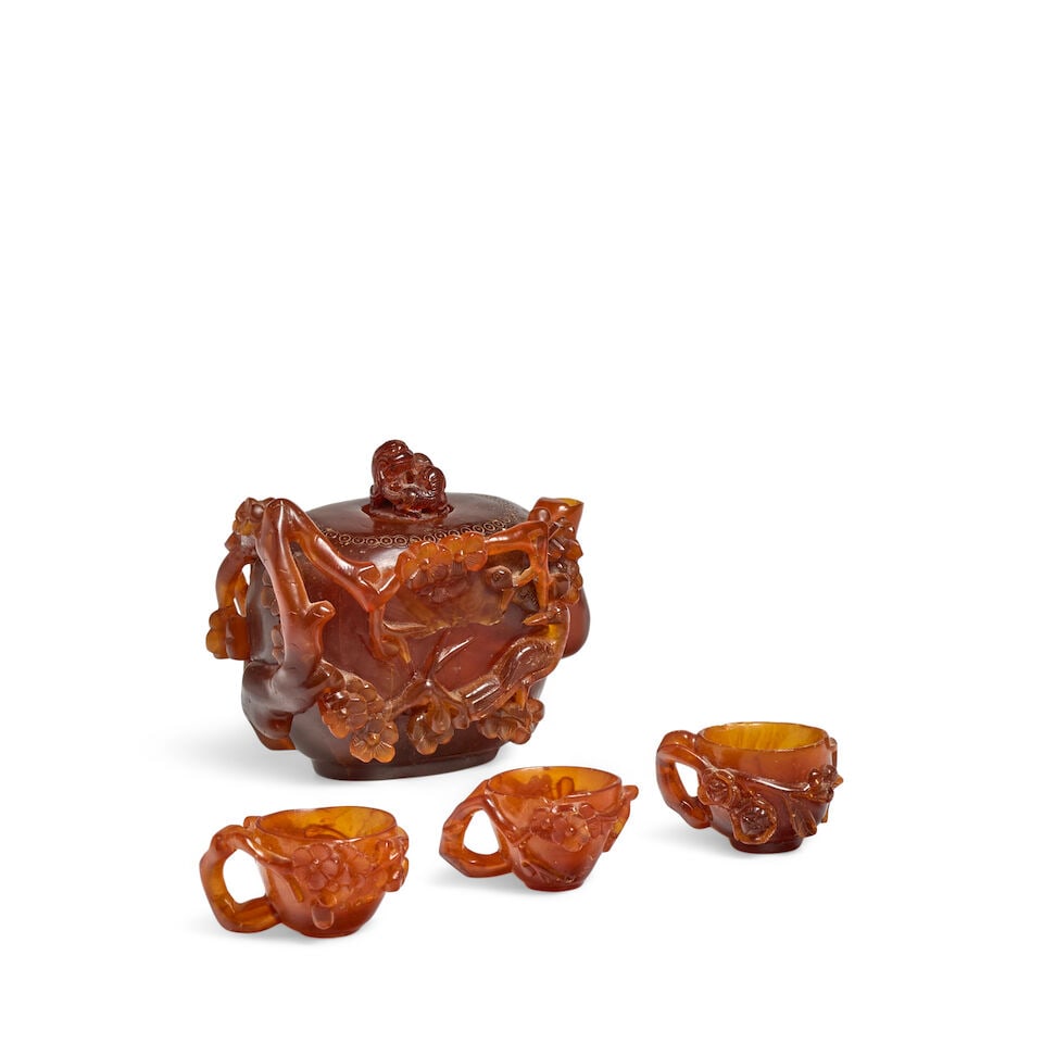 A GROUP OF FOUR AMBER CARVED 'PRUNUS' TEA VESSELS 19th century (4) - 3