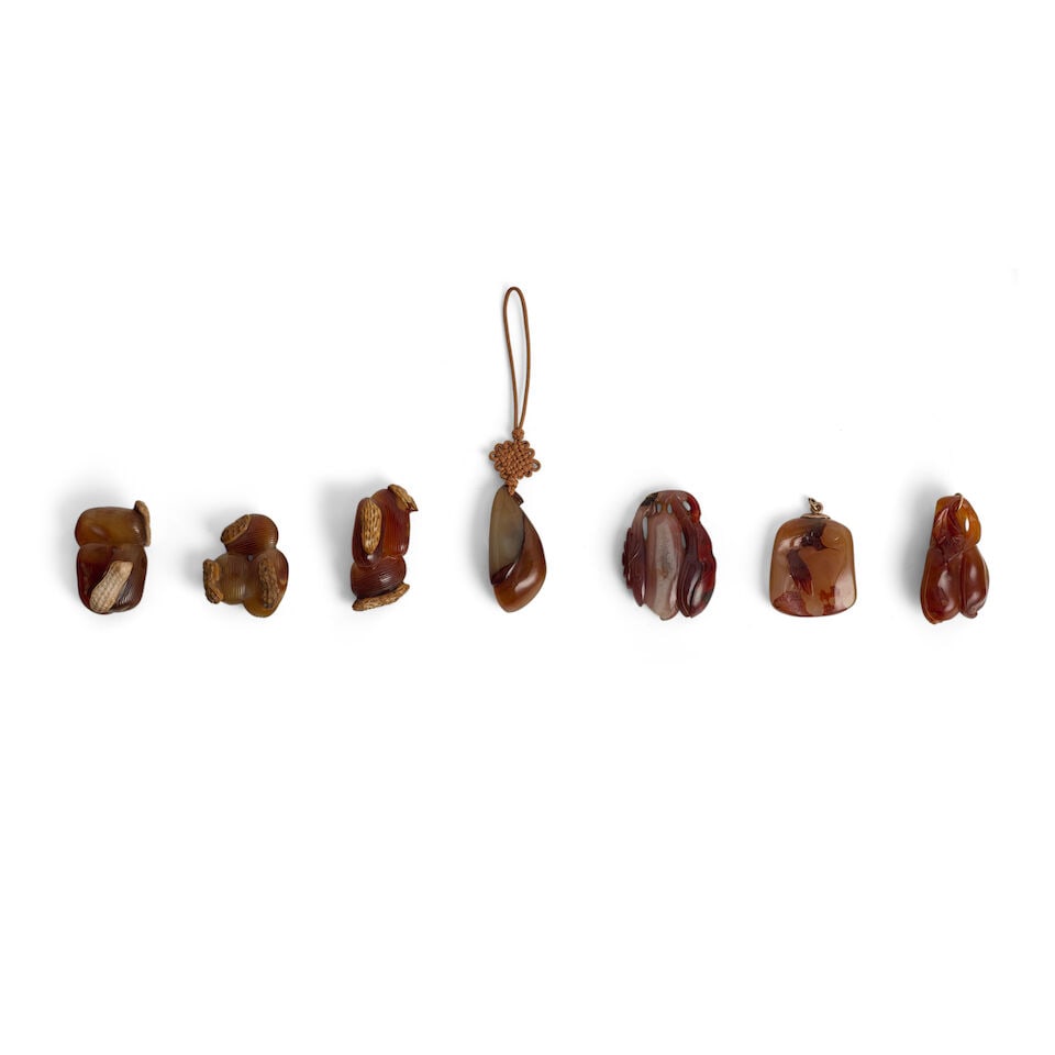 A GROUP OF SEVEN AGATE CARVINGS 20th century (7): A GROUP OF SEVEN AGATE CARVINGS 20th century 2in (5.1cm) to 2 1/2in (6.4cm) (7). Footnotes: 二十世紀 瑪瑙雕墜一組七件 Provenance
