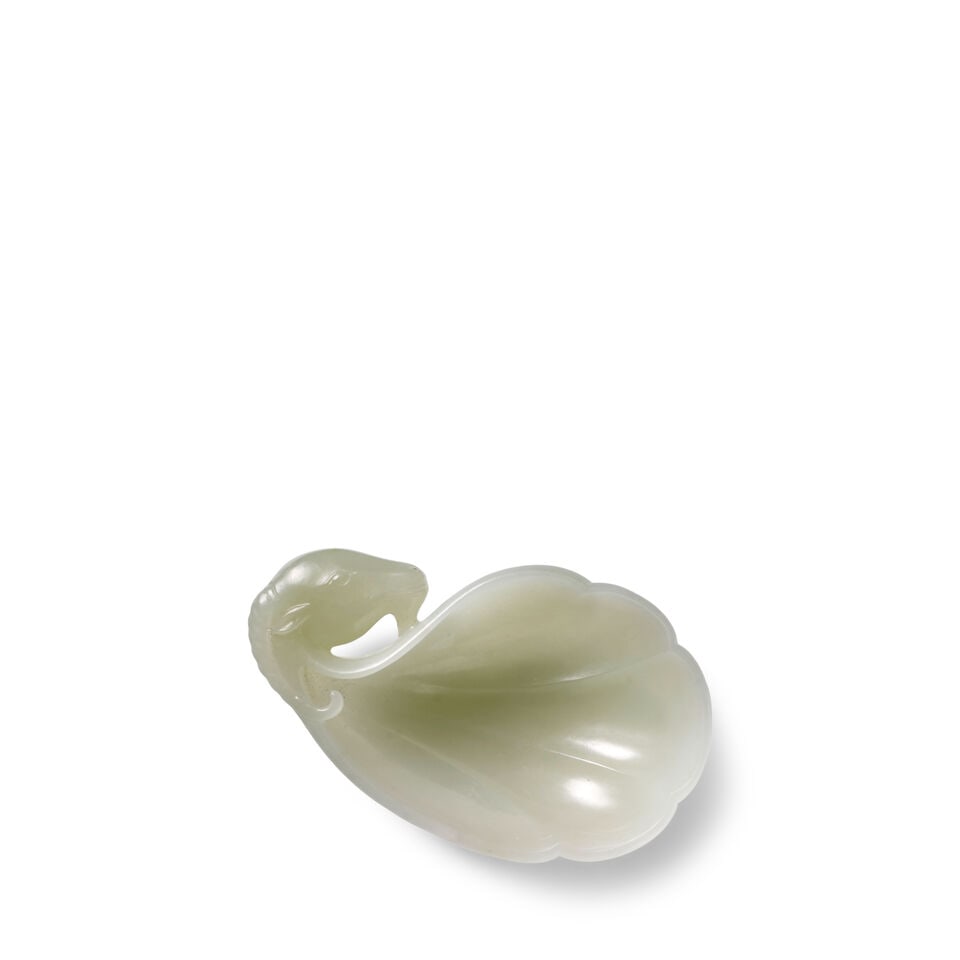 A SMALL MUGHAL-STYLE PALE CELADON JADE IBEX-HANDLED CUP 20th century (1 of 2)