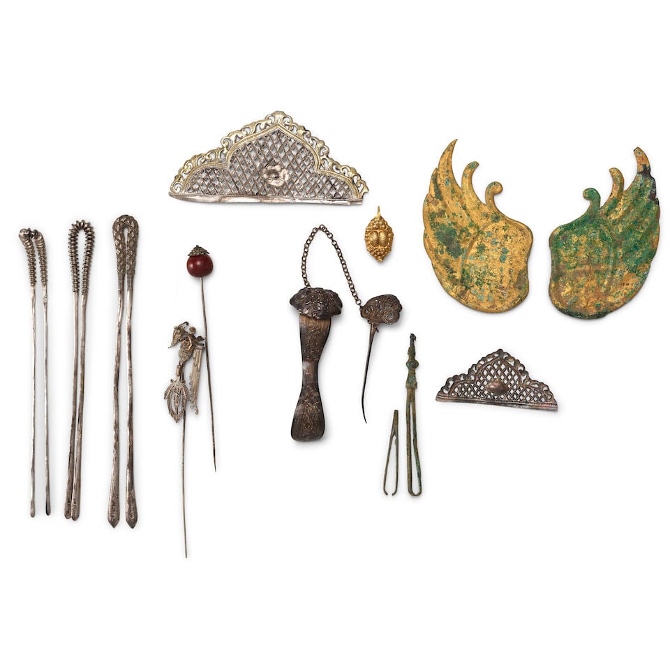 A GROUP OF SILVER-ALLOY AND COPPER-ALLOY PERSONAL ADORNMENT Song and Qing Dynasty (approx. 15 i...: A GROUP OF SILVER-ALLOY AND COPPER-ALLOY PERSONAL ADORNMENT Song and Qing Dynasty Comprising three long 'U'-shape hairpins; a set of two repoussé hair ornaments connected by chain; a 'phoenix' ha