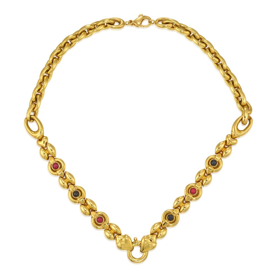 AN 18K GOLD, SAPPHIRE AND RUBY NECKLACE: AN 18K GOLD, SAPPHIRE AND RUBY NECKLACE • Three round cabochon rubies weighing approximately 0.60 carat total • Three round cabochon sapphires weighing approximately 0.87 carat total