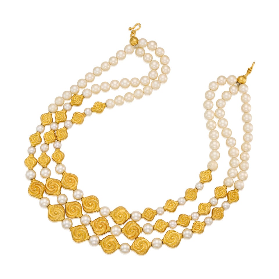 22K GOLD BEADED TRIPLE STRAND NECKLACE: 22K GOLD BEADED TRIPLE STRAND NECKLACE • 22K carved gold drilled beads measuring approximately 11.69mm x 10.43mm to 15.98mm x 14.32mm • Numerous faux pearls measuring approximately 8.17mm