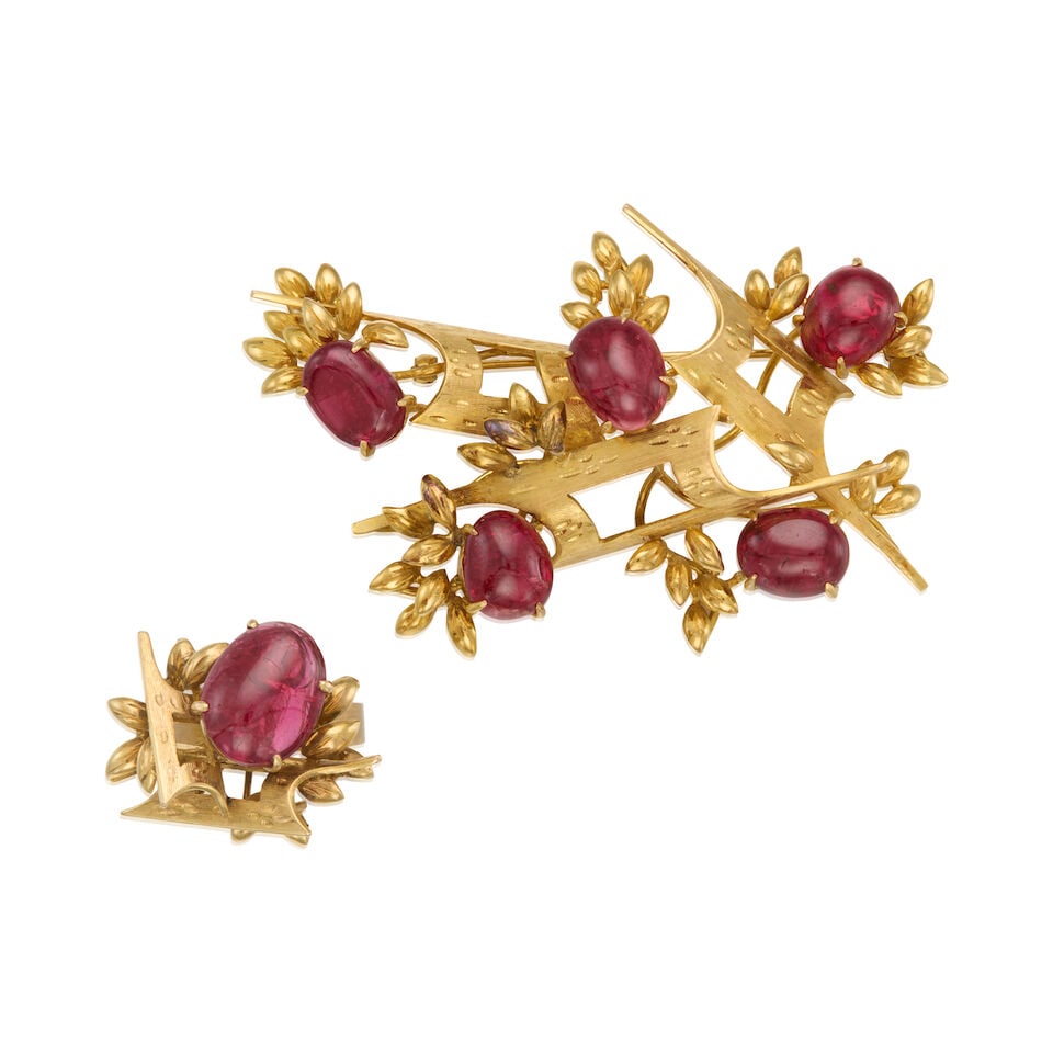 GOLD AND SPINEL BROOCH AND RING: GOLD AND SPINEL BROOCH AND RING • A 14K yellow gold ring with a cabochon spinel measuring approximately 13.33mm x 10.24mm x 3.52mm, size 5 3/4 • A 14K yellow gold brooch with five cabochon