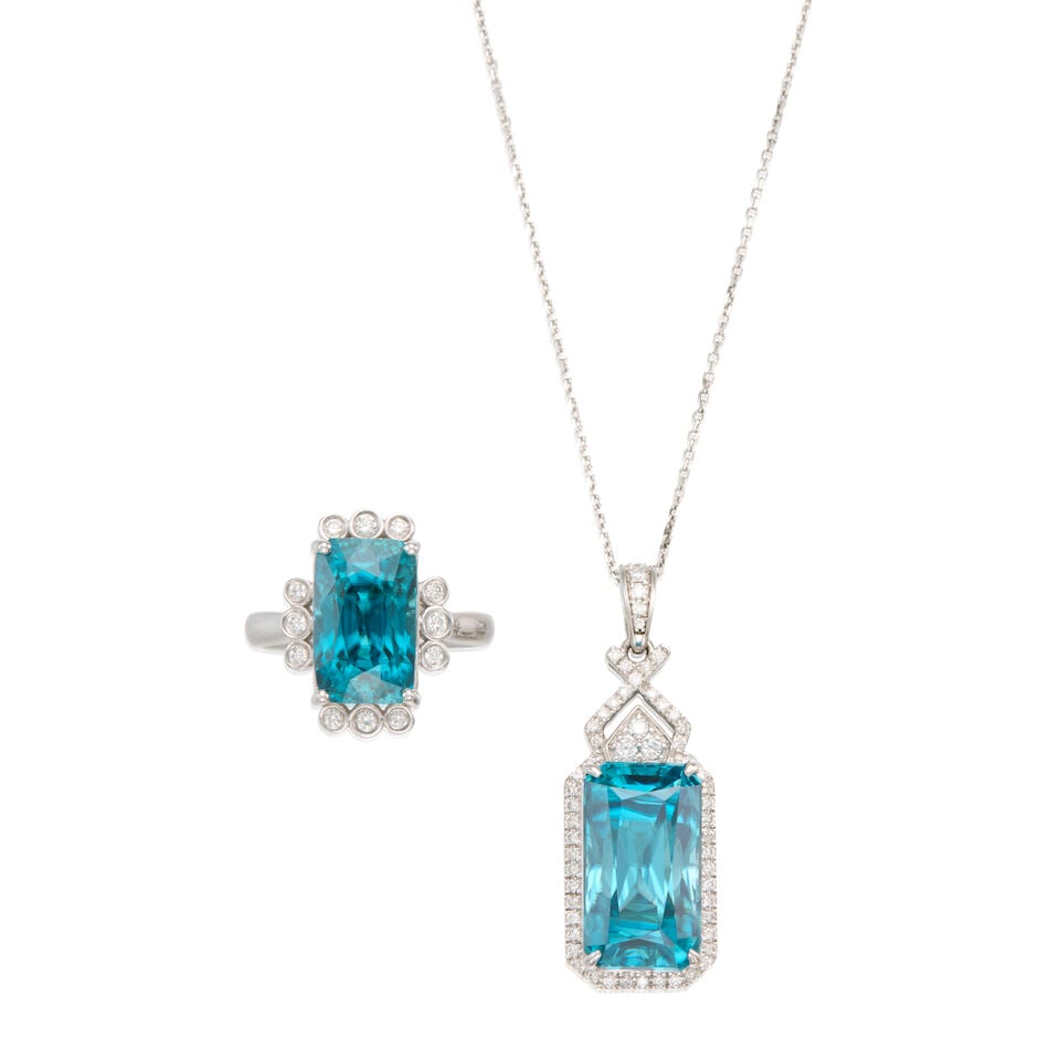 14K WHITE GOLD, ZIRCON, AND DIAMOND PENDANT NECKLACE AND RING: 14K WHITE GOLD, ZIRCON, AND DIAMOND PENDANT NECKLACE AND RING • A 14K white gold pendant and chain with one rectangular shaped zircon weighing approximately 20.95 carats and numerous round