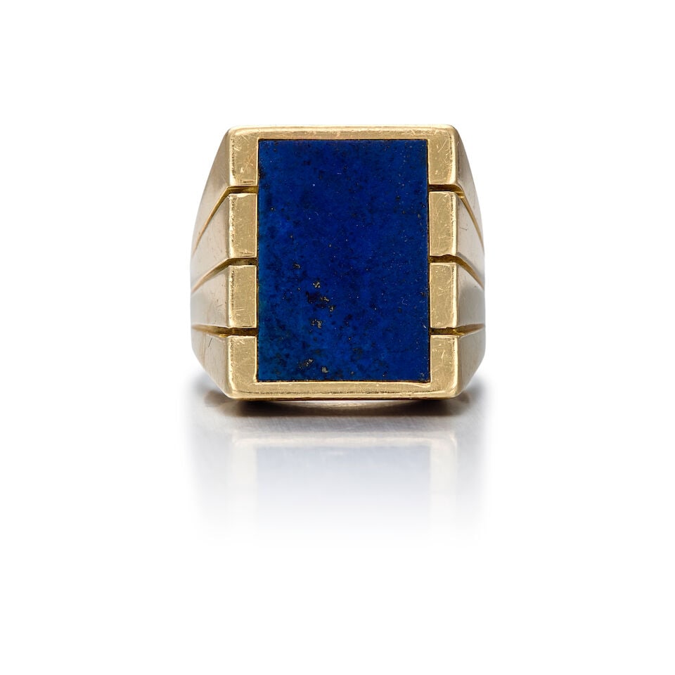 14K YELLOW GOLD AND LAPIS LAZULI RING: 14K YELLOW GOLD AND LAPIS LAZULI RING • A rectangular shaped lapis lazuli tablet measuring approximately 17.30mm x 12.20mm x 2.96mm • Size 9 • Estimated gross weight: 14.6