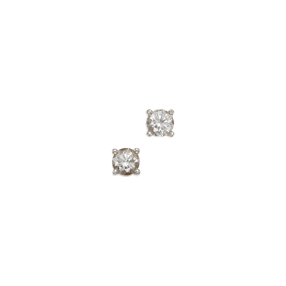 TIFFANY & CO.: PLATINUM DIAMOND STUD EARRINGS: TIFFANY & CO.: PLATINUM DIAMOND STUD EARRINGS • Two round brilliant cut diamonds weighing approximately 0.30 carat total • Stamped T & CO. on earrings and backings • Measures 5/8 in.