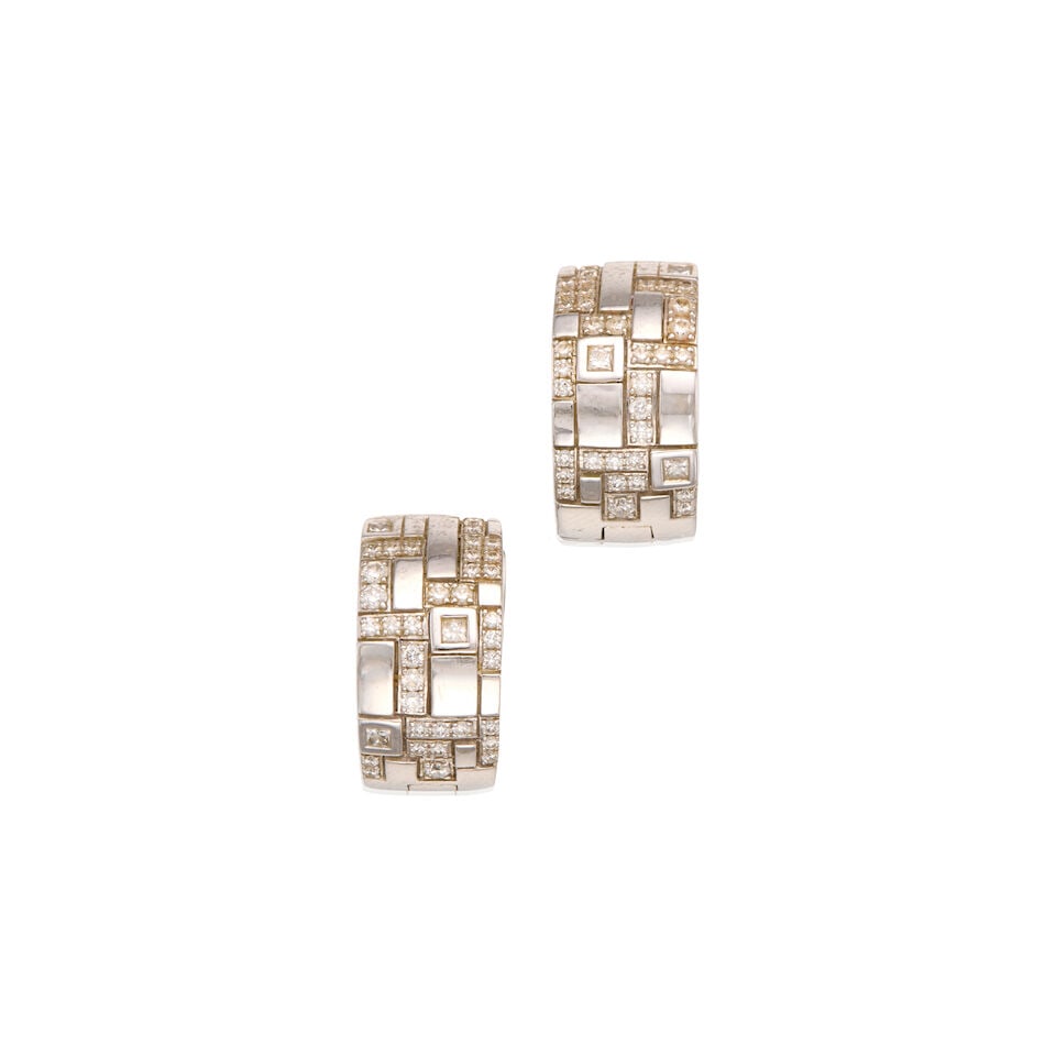 18K WHITE GOLD AND DIAMOND EARRINGS: 18K WHITE GOLD AND DIAMOND EARRINGS • Six square shaped diamonds weighing approximately 0.12 carat total • Numerous round brilliant cut diamonds weighing approximately 0.62 carat total 