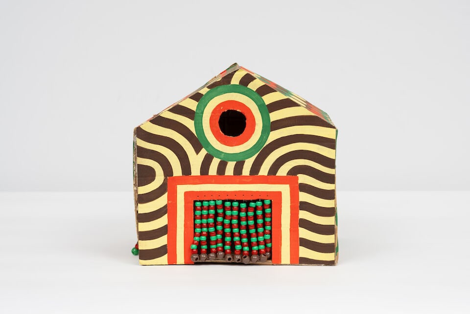 LAKWENA (B. 1986) Box House 1 (Executed in 2025 ): LAKWENA (B. 1986) Box House 1 casein paint, cardboard, plastic beads and fishing wire 28 x 28 x 28cm (11 x 11 x 11in). Executed in 2025 Footnotes: Provenance Donated by the artist Image: ©