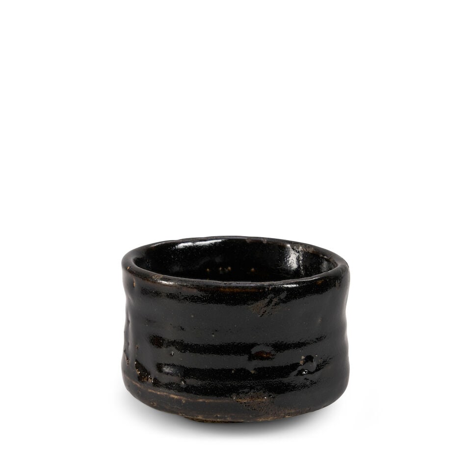 A Stoneware Hikidashi Chawan Japan, Showa (1926-1989) or Heisei (1989-2019) era, late 20th century,: A Stoneware Hikidashi Chawan Japan, Showa (1926-1989) or Heisei (1989-2019) era, late 20th century, Covered in a lustrous black glaze, with a wood tomobako 2 7/8in (7.3cm) high Lot to be sold without 