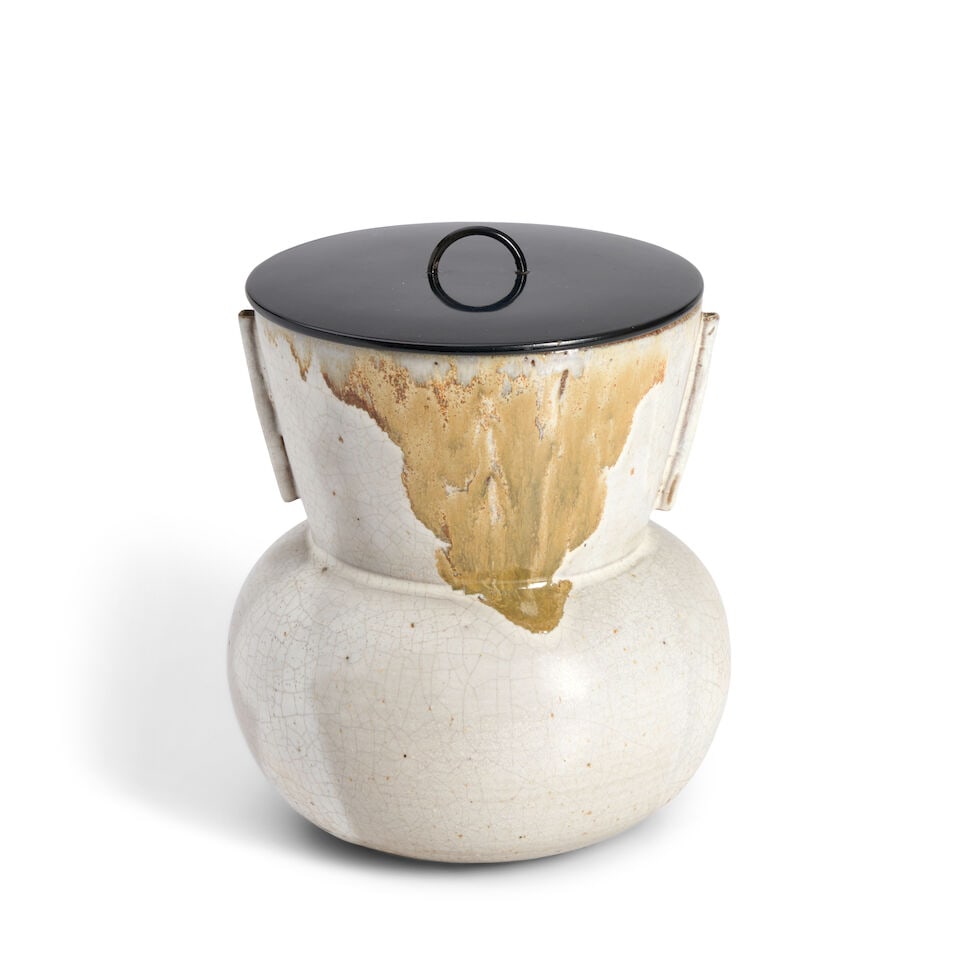 A Stoneware Takatori-style Mizusashi (Fresh-water Jar) Japan, Showa (1926-1989) or Heisei (1989-...: A Stoneware Takatori-style Mizusashi (Fresh-water Jar) Japan, Showa (1926-1989) or Heisei (1989-2019) era, late 20th century, Decorated with a mottled green ash glaze, with a wood tomobako 8 3/4in (22