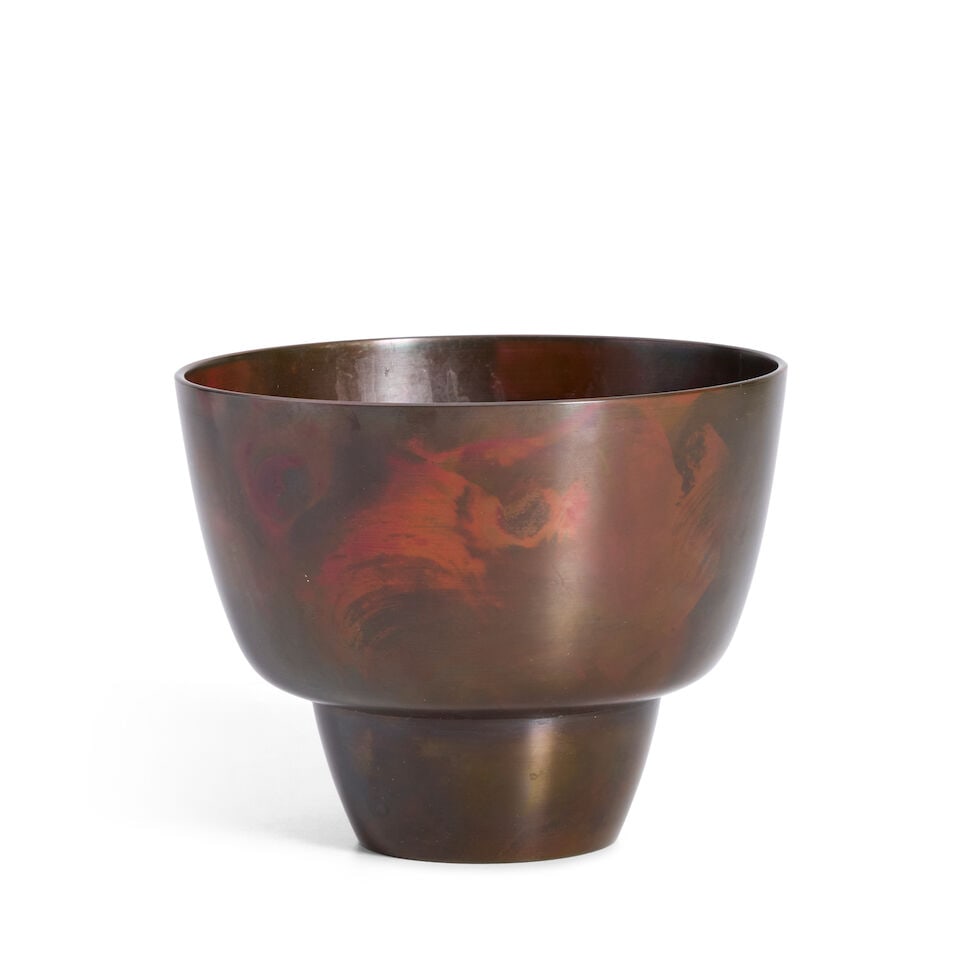 A Bronze Bowl Japan, 20th century,: A Bronze Bowl Japan, 20th century, Steeply rising sides with swirls of red patina 4 7/8in (12.4cm) high For further information on this lot please visit Bonhams.com For further information about this