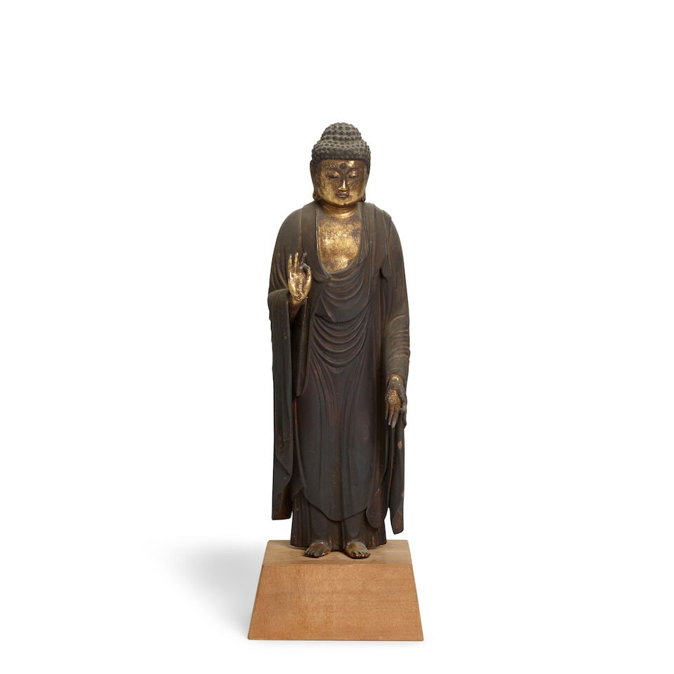 A Wood Figure of Amida Buddha Japan, Edo period (1615-1868), 18th century,: A Wood Figure of Amida Buddha Japan, Edo period (1615-1868), 18th century, The figure shown standing and leaning slightly forward, his hands held in the mudra of teaching, ushisha inlaid in glass, on 