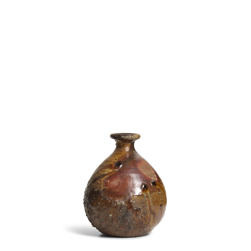 Fujiwara Yu (1931-2001), A Bizen Stoneware Tokkuri (Sake Bottle) Japan, Showa (1926-1989) or Hei...: Fujiwara Yu (1931-2001), A Bizen Stoneware Tokkuri (Sake Bottle) Japan, Showa (1926-1989) or Heisei (1989-2019) era, Decorated in a feldspathic glaze, collecting in drips on the body, with a wood tomo