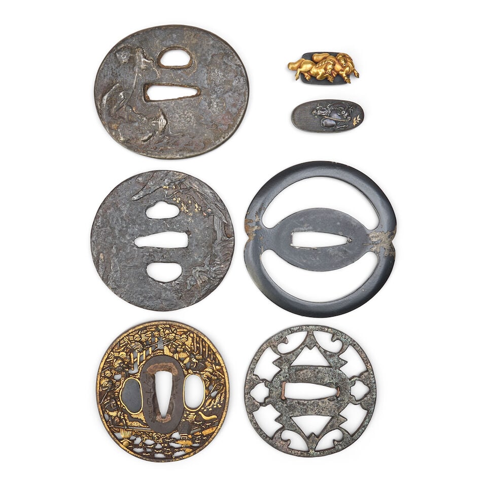 A Group of Eight Metal and Iron Tsuba and Accessories Japan, late Edo period (1615-1868) or Meij...: A Group of Eight Metal and Iron Tsuba and Accessories Japan, late Edo period (1615-1868) or Meiji era (1868-1912), 19th century, Five metal tsuba, two iron; a kashira, a gold clasp; and a silver ornam