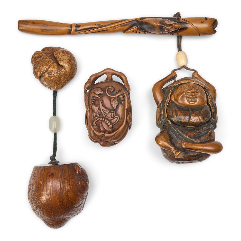 Three Carved Wood Containers Japan, late Edo period (1615-1868) or Meiji era (1868-1912), 19th c...: Three Carved Wood Containers Japan, late Edo period (1615-1868) or Meiji era (1868-1912), 19th century, A pipe case and tobacco box; a sake cup with an attached netsuke; and a small box in the form of