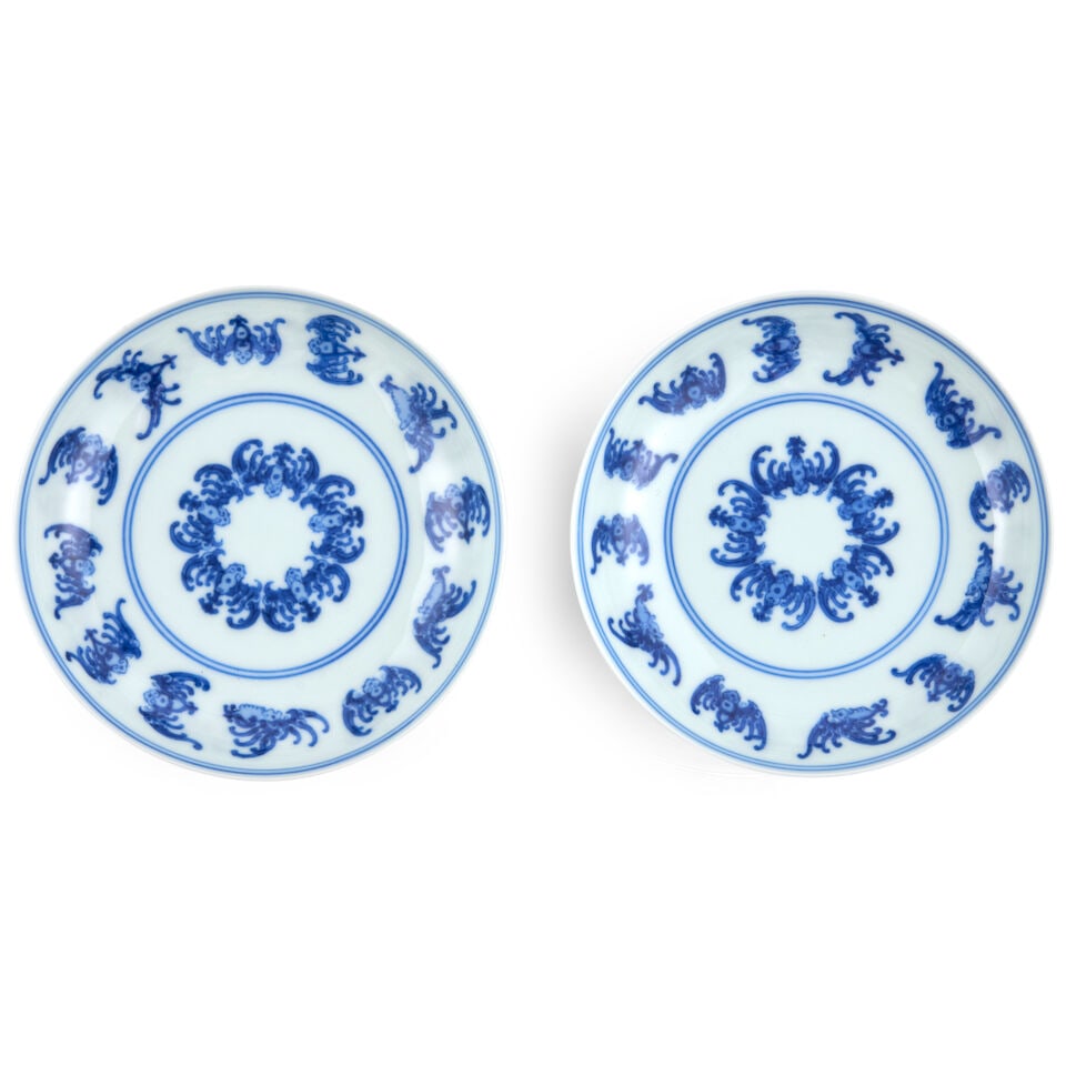 Two Blue and White 'Bats' Saucer Dishes China, Yongzheng marks, 20th century, (2): Two Blue and White 'Bats' Saucer Dishes China, Yongzheng marks, 20th century, 4 1/2in (11.4cm) diam (2). Footnotes: Provenance: Property from the Collection of Alan and Simone Hartman This lot is subj