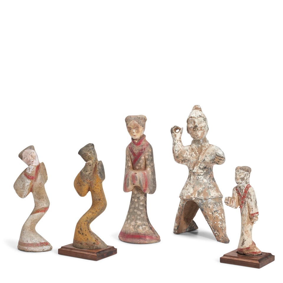 Five Painted Gray Pottery Figures China, Han dynasty and later, (5): Five Painted Gray Pottery Figures China, Han dynasty and later, Three performers; a standing attendant; and an archer. height of the tallest 15in (38.2cm) (5). Footnotes: Provenance: Property from the
