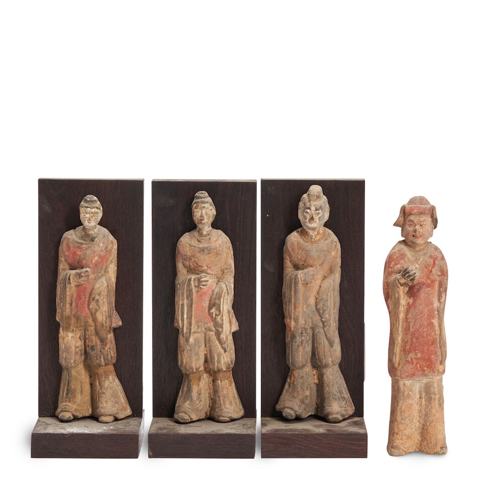 A Group of Four Glazed Pottery Figures China, Northern Wei dynasty style, 20th century, (4): A Group of Four Glazed Pottery Figures China, Northern Wei dynasty style, 20th century, All standing figures decorated with traces of polychrome pigment, three mounted to wood stands 7 1/2in (19.1cm);