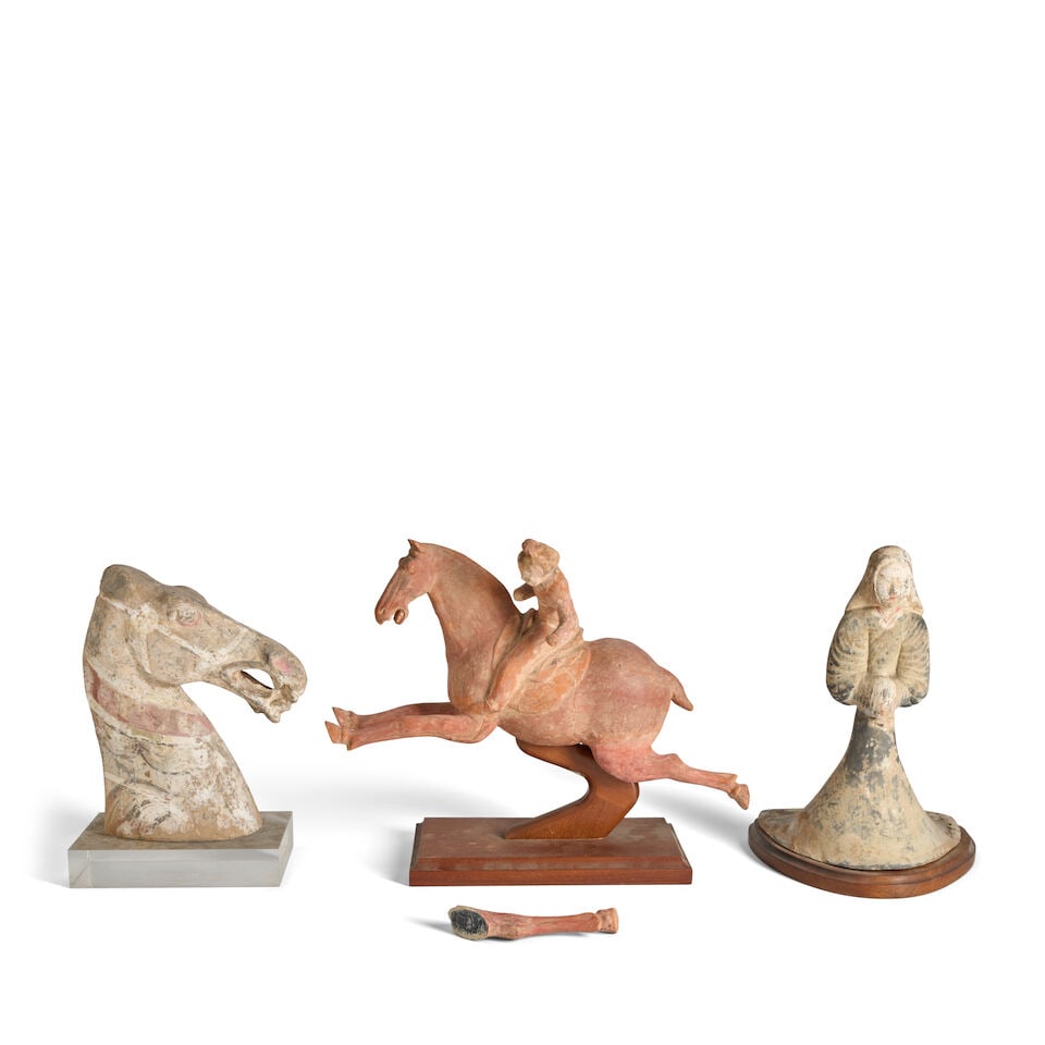 Three Painted Pottery Figures China, Han dynasty and Tang dynasty style, 20th century, (3): Three Painted Pottery Figures China, Han dynasty and Tang dynasty style, 20th century, A painted pottery horse head, Han dynasty; together with a court woman, Han dynasty; and a red pottery polo playe