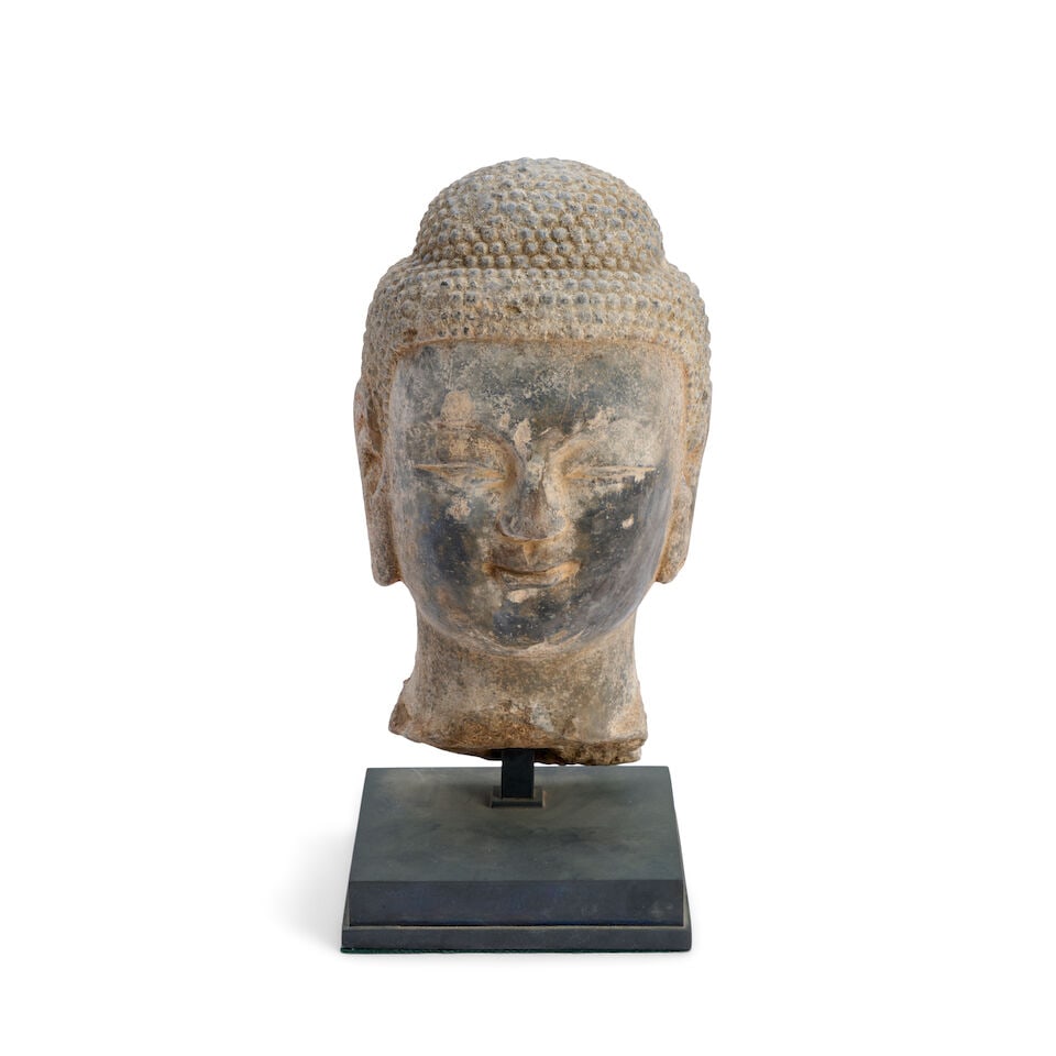 A Carved Stone Head of the Buddha China, Northern Qi style, 20th century, (1 of 2)