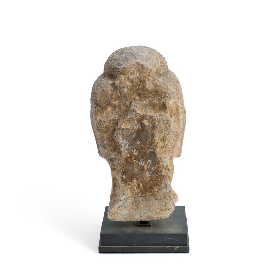 A Carved Stone Head of the Buddha China, Northern Qi style, 20th century, - 2
