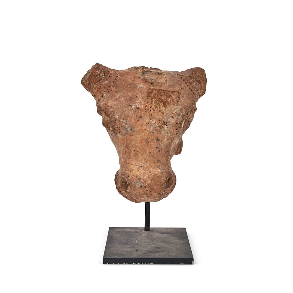 A Stucco Fragment of a Bull Head Southern India, 20th century,: A Stucco Fragment of a Bull Head Southern India, 20th century, 5in (12.7cm) high Footnotes: Provenance: Property from the Collection of Alan and Simone Hartman This lot is subject to the following lot
