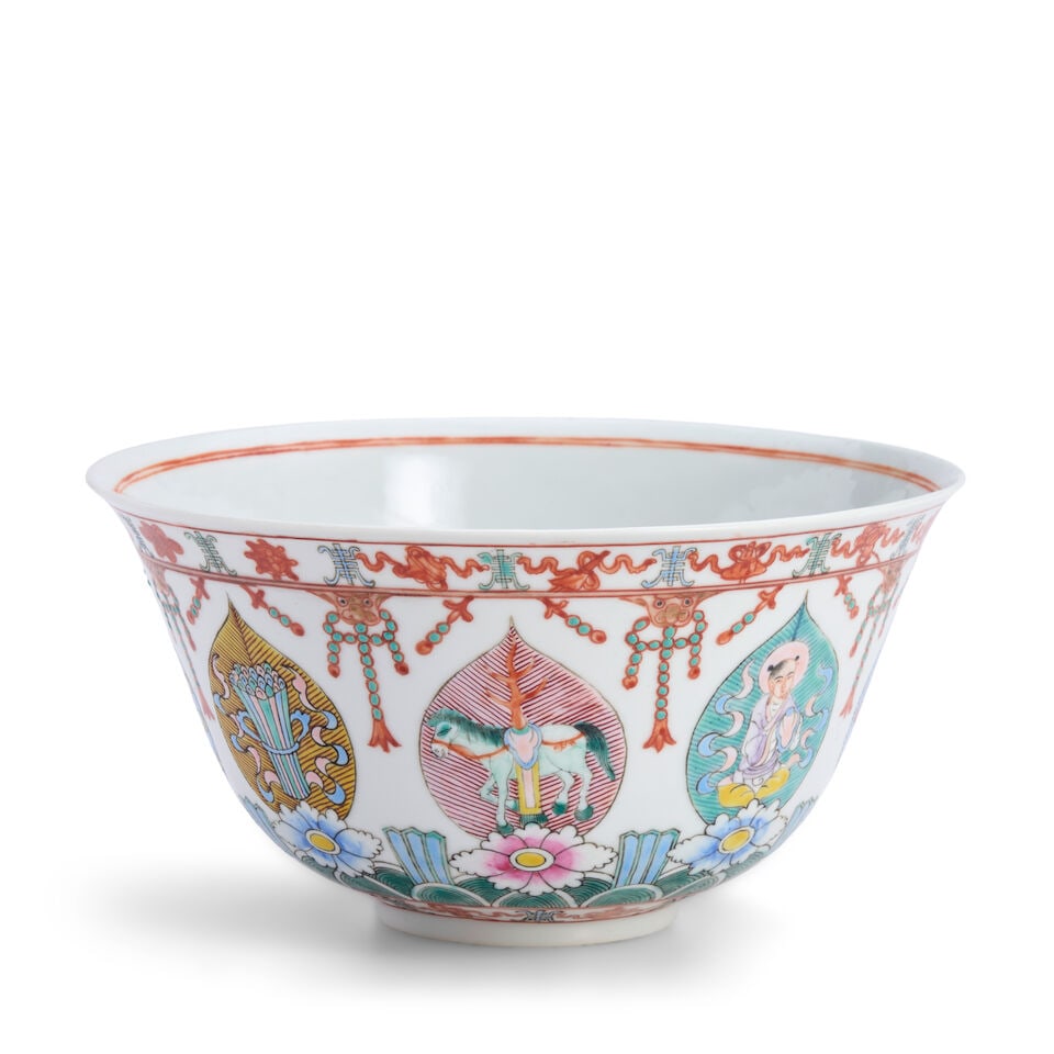 A Famille Rose Enameled Bowl China, 20th century,: A Famille Rose Enameled Bowl China, 20th century, The high flared sides decorated with Buddhist figures and emblems, an iron-red Baragon Tumed mark in Mongolian script on the base 4 3/8 x 8 1/2in (11.