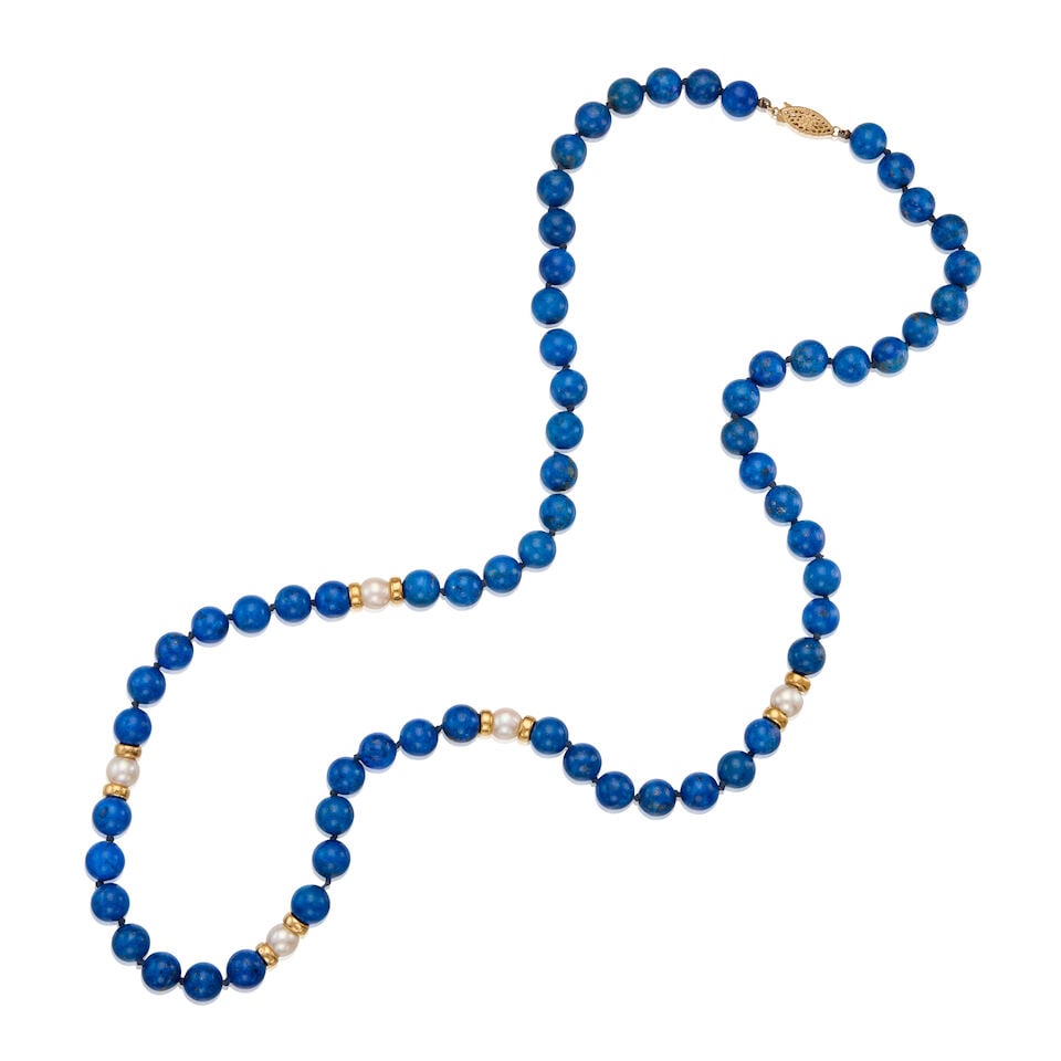 14K GOLD, LAPIS LAZULI, AND CULTURED PEARL NECKLACE: 14K GOLD, LAPIS LAZULI, AND CULTURED PEARL NECKLACE • 14K gold clasp and ten gold and drilled beads measuring approximately 6.38mm in diameter • Numerous round and drilled lapis lazuli