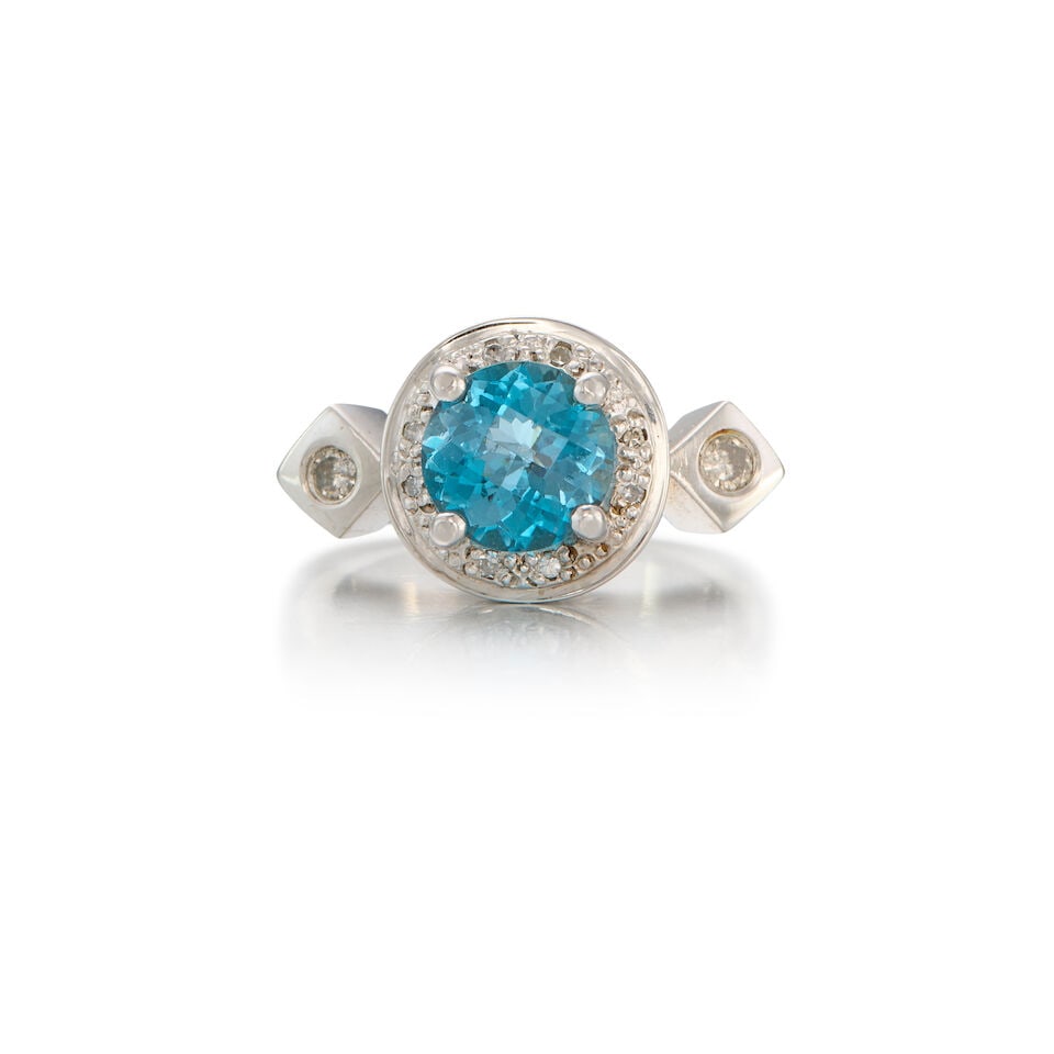 14K WHITE GOLD, TOPAZ AND DIAMOND RING: 14K WHITE GOLD, TOPAZ AND DIAMOND RING • One round mixed cut topaz measuring approximately 8.16mm x 8.09mm x 5.55mm • Numerous round brilliant and single cut diamonds weighing approximatel