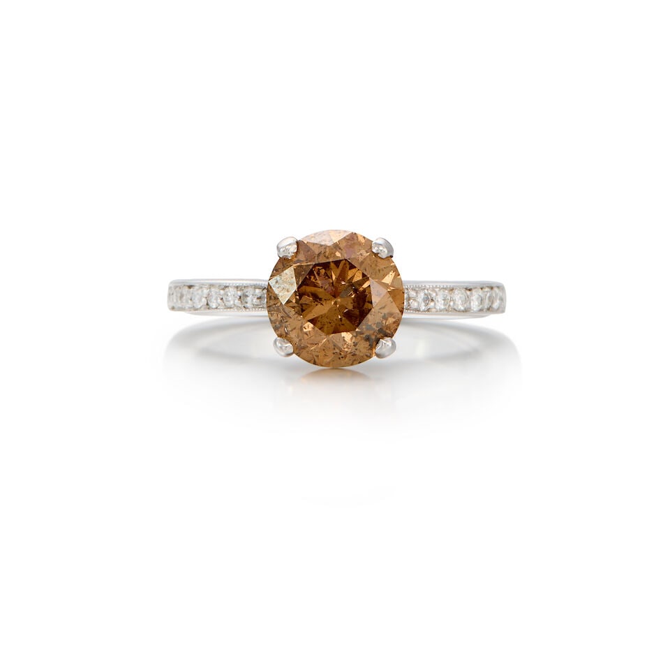 14K WHITE GOLD, COLORED DIAMOND, AND DIAMOND RING WITH GIA REPORT: 14K WHITE GOLD, COLORED DIAMOND, AND DIAMOND RING WITH GIA REPORT • A round brilliant cut diamond weighing approximately 2.09 carats, measures 7.82-7.88mm x 5.11mm • Numerous round shaped