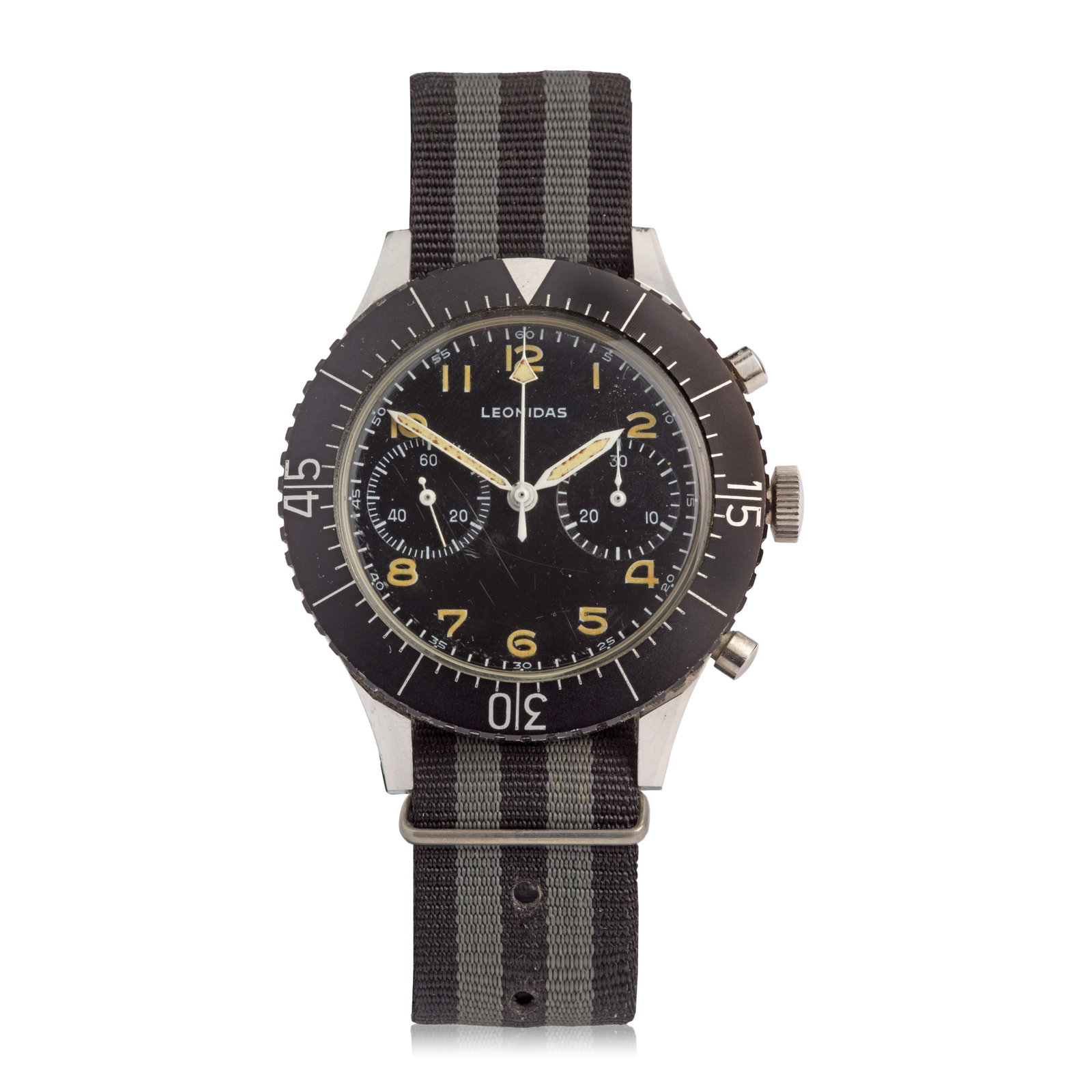 Leonidas. A stainless steel military manual wind flyback chronograph wristwatch issued to the It...: Leonidas. A stainless steel military manual wind flyback chronograph wristwatch issued to the Italian Army Model: CP-2 Date: Circa 1960 Movement: Jewelled Valjoux Cal.222 manual wind Dial: Black, lumi