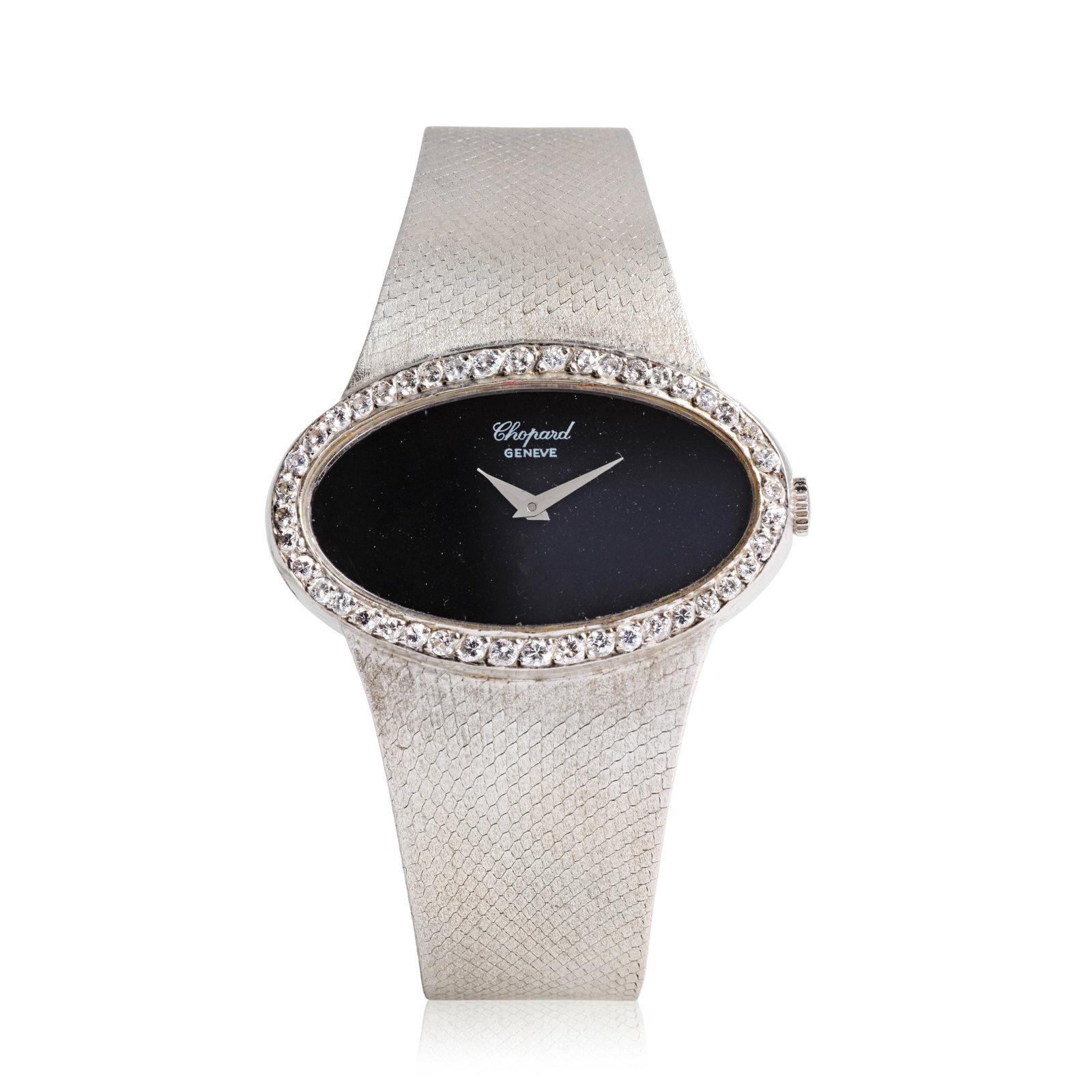 Chopard for Kutchinsky. A lady's 18K white gold diamond set manual wind oval bracelet watch with...: Chopard for Kutchinsky. A lady's 18K white gold diamond set manual wind oval bracelet watch with onyx dial Reference: 5047 1 Date: London Import mark for 1972 Movement: 17-jewel Cal.2512 manual wind D