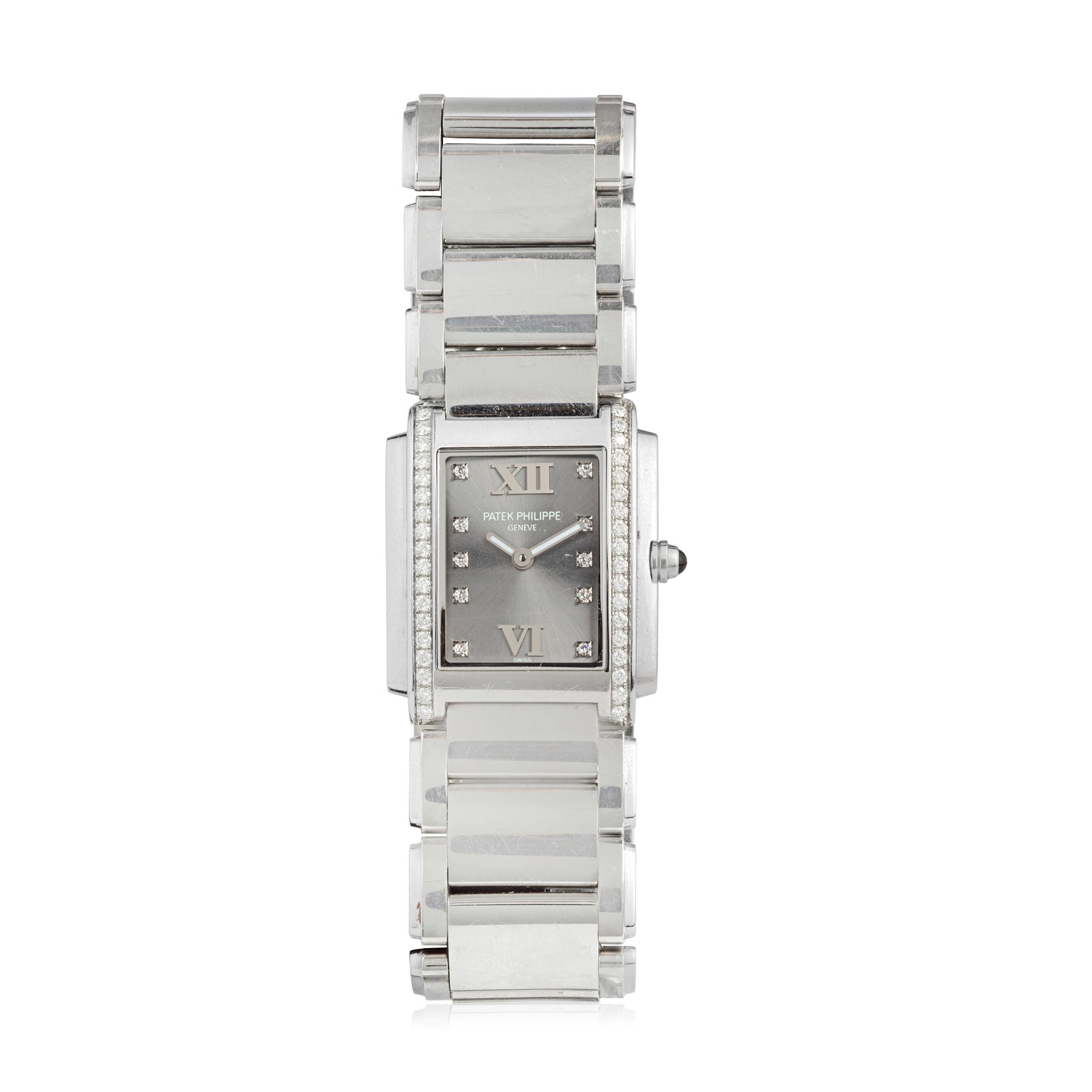 Patek Philippe. A lady's stainless steel and diamond set quartz rectangular bracelet watch Twen...: Patek Philippe. A lady's stainless steel and diamond set quartz rectangular bracelet watch Model: Twenty-4 Reference: 4910/10 Date: Circa 2010 Movement: 6-jewel Cal.E15 quartz, No.5744834 Dial: Sunbur