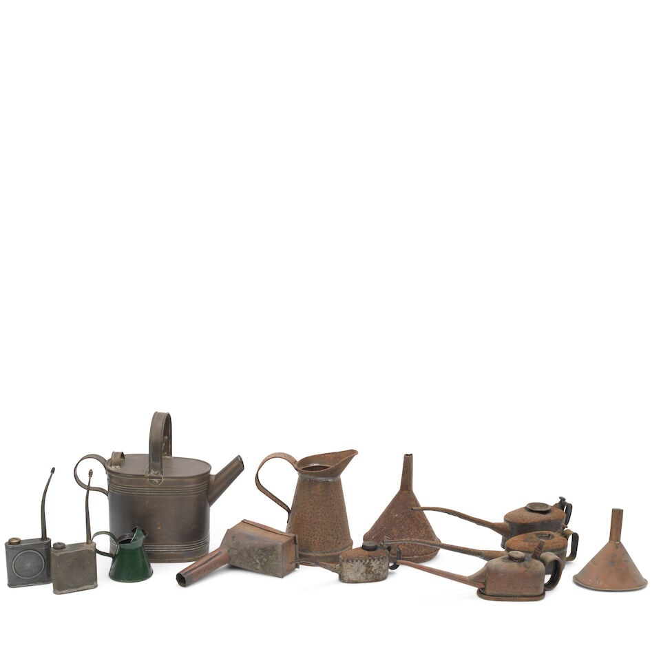 Ten copper fluid measuring cans, ((22)) (1 of 2)