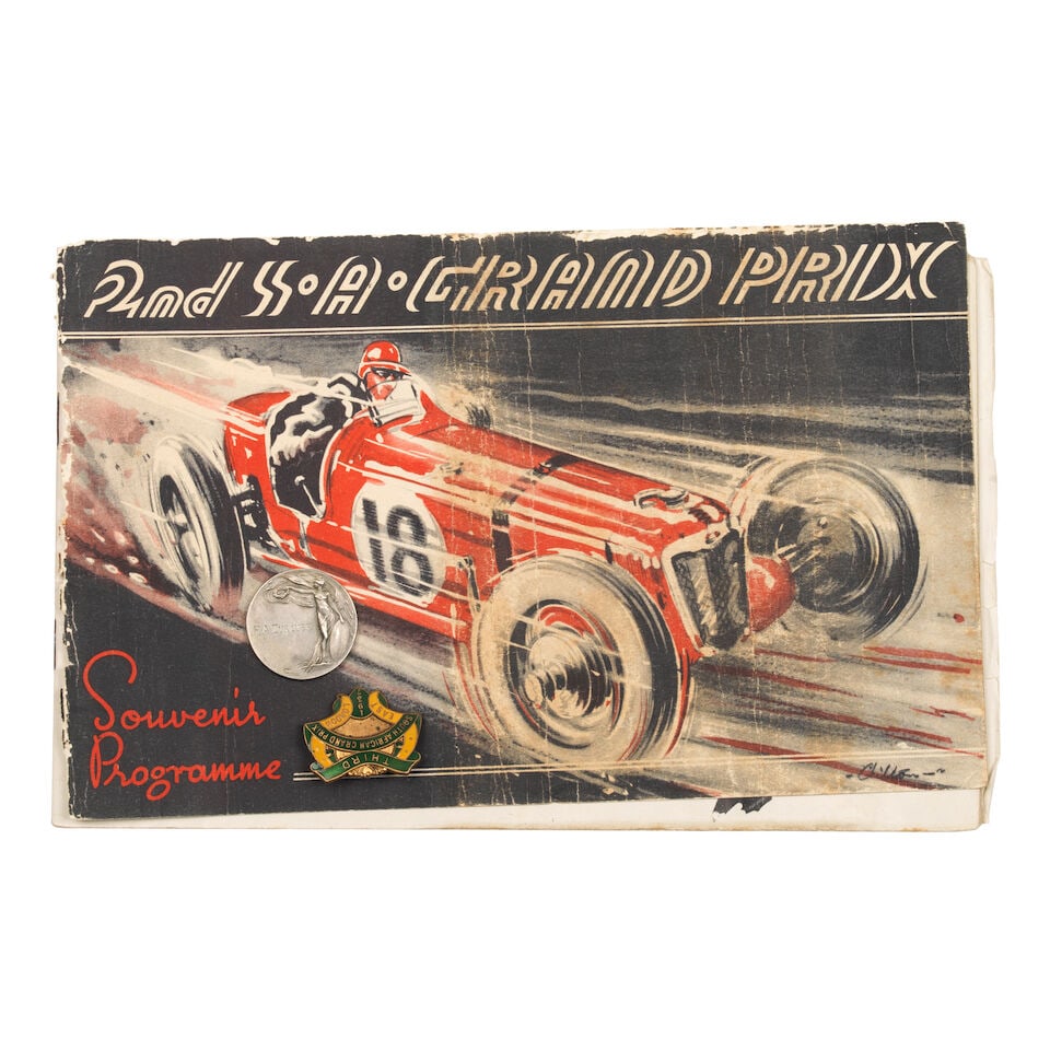 A fine enamel lapel badge for the Third South African Grand Prix, 1937, ((3)): A fine enamel lapel badge for the Third South African Grand Prix, 1937, in green and yellow enamel by J Gaunt of London, number 7048, 3cm wide; together with a silver medallion to commemorate the open